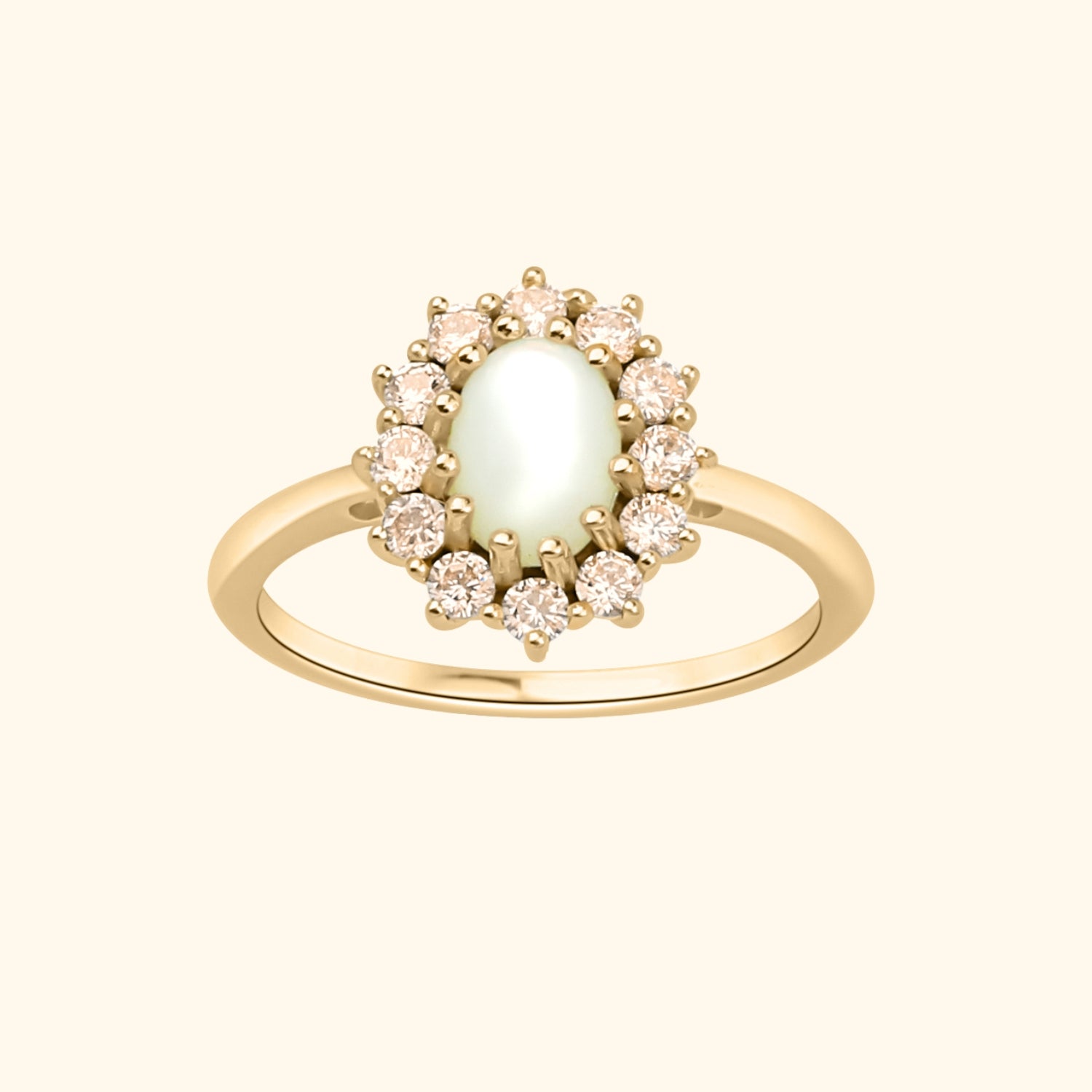 Goudkleurige Lady Diana ring met parelmoer en champagne zirconia