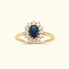 Lady diana ring met blauwe steen en witte zirconia steentjes_gold plated brass